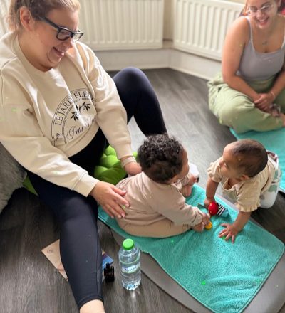 new parents at flourish baby massage babies playing in stratford london